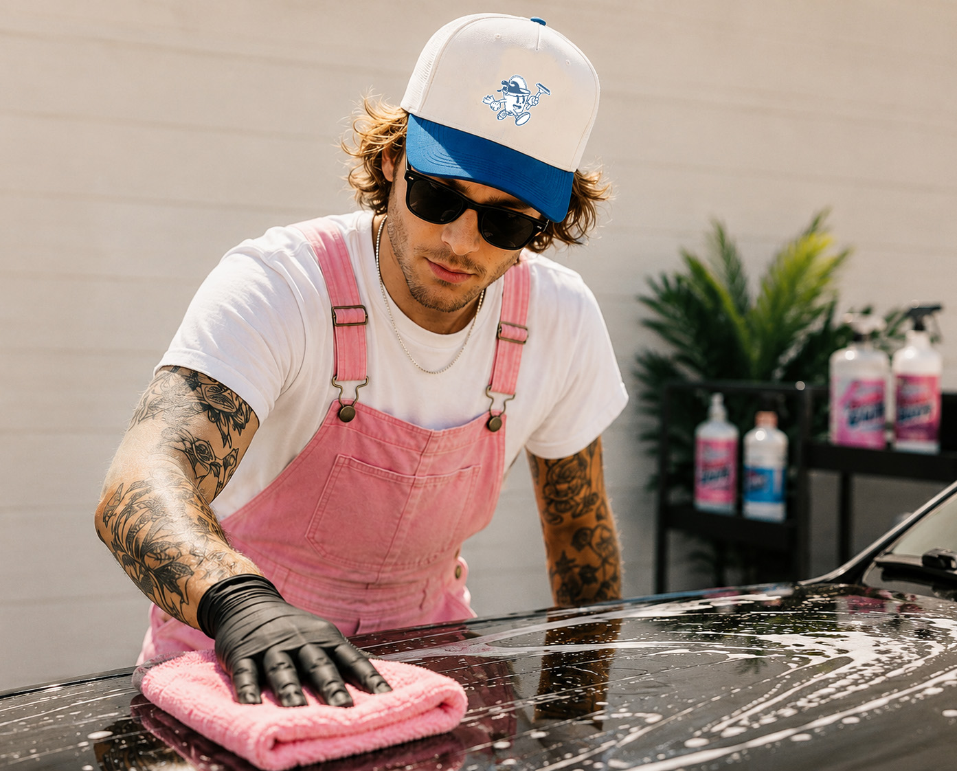 Foam Guys detailer carefully cleaning a vehicle